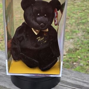 Elegant Black and Gold Plush Bear